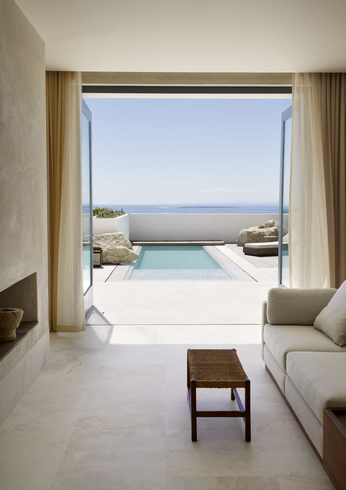 Living room at House T looking through to the pool and the Atlantic horizon